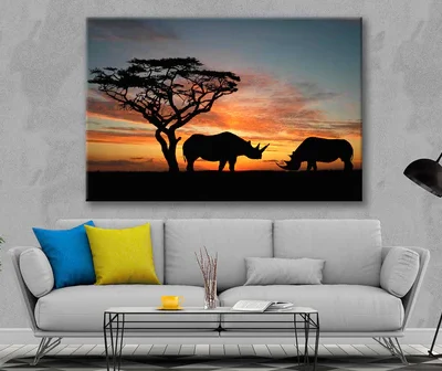 Bella Home Two Rhinoceros Over Orange Sky Print Canvas Ready to hang